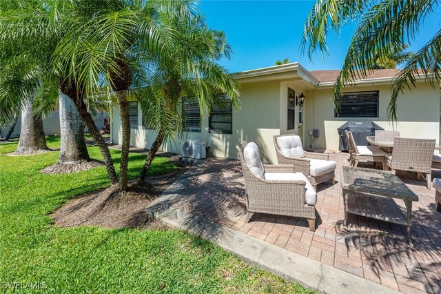 3586 Santiago Way, Naples, FL 34105 - view of patio with an outdoor living space and a cooling unit