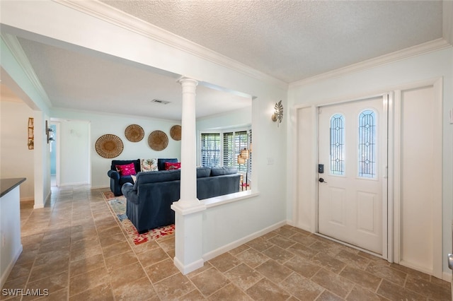 3586 Santiago Way, Naples, FL 34105 - entrance foyer with ornamental molding, stone finish floors, a textured ceiling, ornate columns, and baseboards