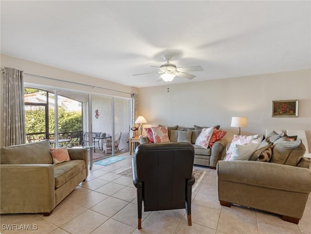 11921 Seabreeze Cove Ln Unit 104, Fort Myers, FL 33908 - living room featuring light tile patterned floors and ceiling fan