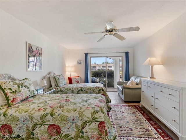 11921 Seabreeze Cove Ln Unit 104, Fort Myers, FL 33908 - bedroom with access to outside and a ceiling fan