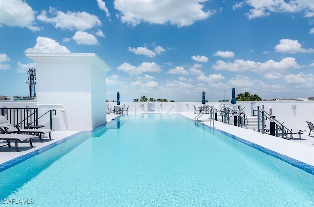 875 6th Ave S Unit 304, Naples, FL 34102 - community pool with a patio