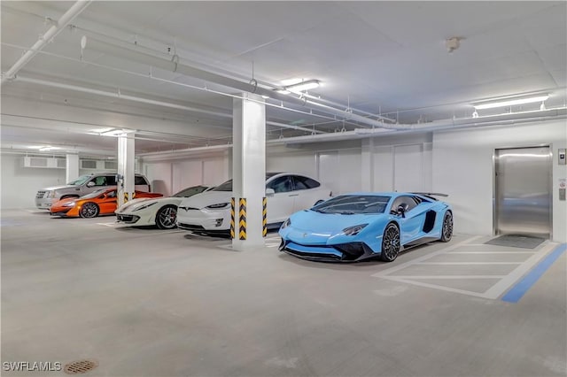 875 6th Ave S Unit 304, Naples, FL 34102 - parking garage with elevator