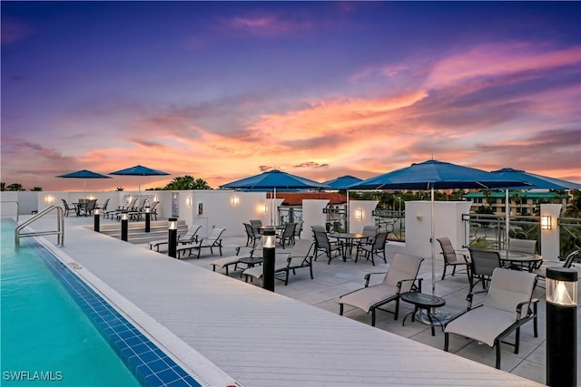 875 6th Ave S Unit 304, Naples, FL 34102 - view of pool with outdoor dining space