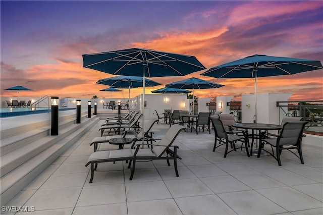 875 6th Ave S Unit 304, Naples, FL 34102 - view of patio featuring outdoor dining area