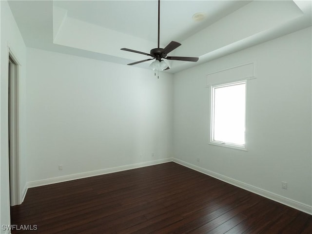 561 Conover Ct, Marco Island, FL 34145 - empty room featuring dark wood finished floors, baseboards, and ceiling fan