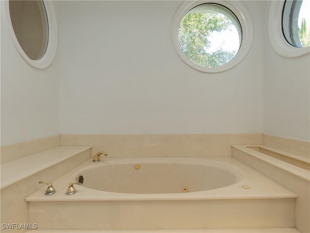 561 Conover Ct, Marco Island, FL 34145 - bathroom with a garden tub