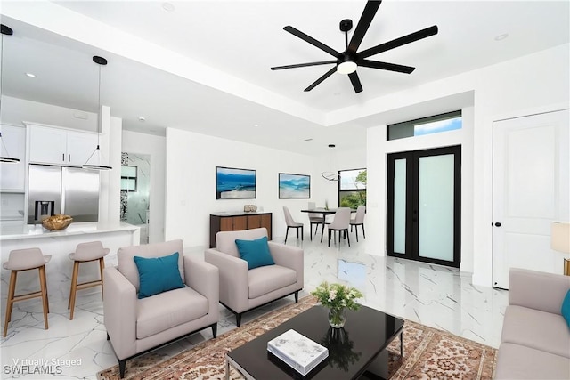 317 Lancelot Ave, Lehigh Acres, FL 33974 - living area featuring light marble finish floors, ceiling fan, and recessed lighting
