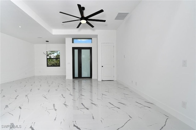 317 Lancelot Ave, Lehigh Acres, FL 33974 - unfurnished room featuring baseboards and ceiling fan