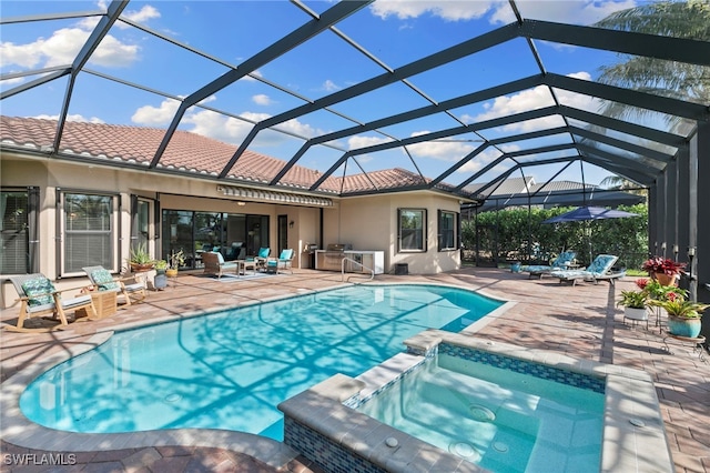 4382 Caldera Cir, Naples, FL 34119 - view of pool with a patio, a pool with connected hot tub, and glass enclosure