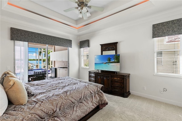 7 Blue Hill Ct, Marco Island, FL 34145 - carpeted bedroom with a tray ceiling, access to outside, ornamental molding, baseboards, and a ceiling fan