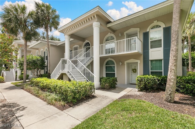 8161 Twelve Oaks Cir Unit 512, Naples, FL 34113 - view of building exterior with stairs