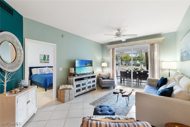 8161 Twelve Oaks Cir Unit 512, Naples, FL 34113 - living room featuring light tile patterned floors and a ceiling fan