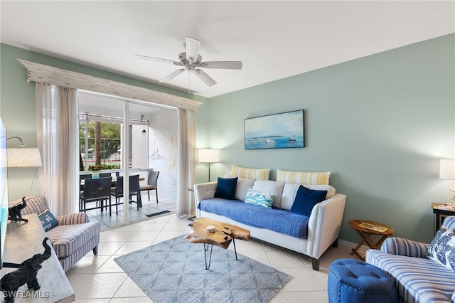 8161 Twelve Oaks Cir Unit 512, Naples, FL 34113 - living area with ceiling fan and light tile patterned floors