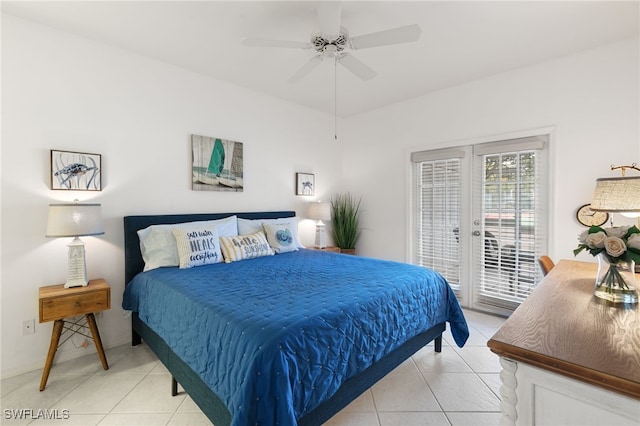 8161 Twelve Oaks Cir Unit 512, Naples, FL 34113 - bedroom with light tile patterned floors, access to exterior, a ceiling fan, and baseboards