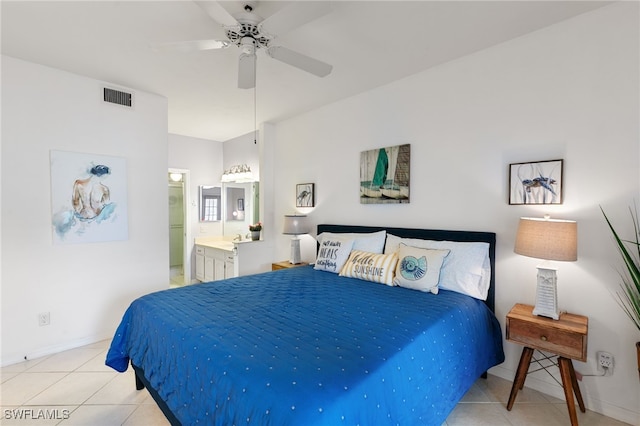 8161 Twelve Oaks Cir Unit 512, Naples, FL 34113 - bedroom featuring light tile patterned floors, baseboards, ensuite bathroom, and ceiling fan
