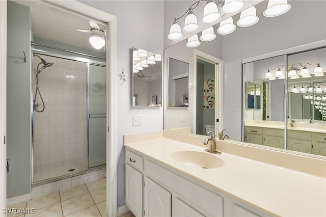 8161 Twelve Oaks Cir Unit 512, Naples, FL 34113 - bathroom with a shower stall, vanity, tile patterned floors, and toilet