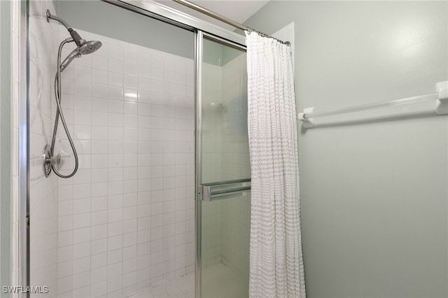 8161 Twelve Oaks Cir Unit 512, Naples, FL 34113 - bathroom featuring a stall shower