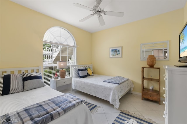 8161 Twelve Oaks Cir Unit 512, Naples, FL 34113 - bedroom featuring light tile patterned floors and ceiling fan