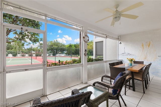 8161 Twelve Oaks Cir Unit 512, Naples, FL 34113 - sunroom / solarium featuring a ceiling fan and outdoor dining area