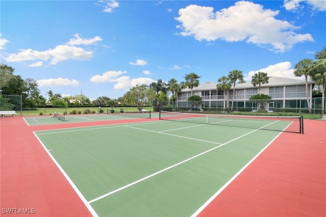8161 Twelve Oaks Cir Unit 512, Naples, FL 34113 - view of tennis court featuring community basketball court
