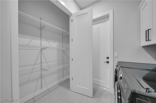 1116 Nimitz Blvd, Lehigh Acres, FL 33974 - clothes washing area with washer and dryer and baseboards