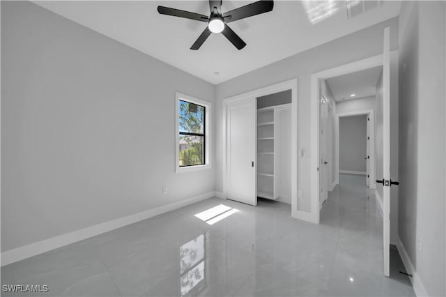 1116 Nimitz Blvd, Lehigh Acres, FL 33974 - unfurnished bedroom featuring baseboards, a closet, and a ceiling fan