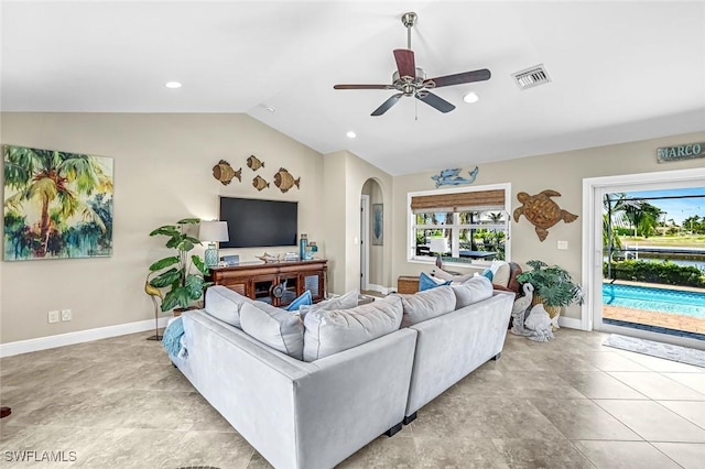 815 Rose Ct, Marco Island, FL 34145 - living area with arched walkways, lofted ceiling, baseboards, a ceiling fan, and recessed lighting