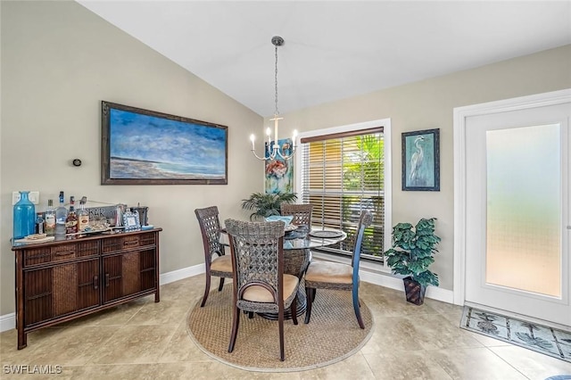 815 Rose Ct, Marco Island, FL 34145 - dining room featuring a chandelier, baseboards, vaulted ceiling, and light tile patterned flooring