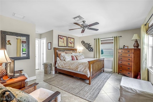 815 Rose Ct, Marco Island, FL 34145 - bedroom with light tile patterned floors, ceiling fan, and baseboards