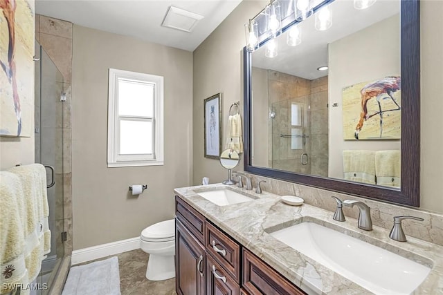 815 Rose Ct, Marco Island, FL 34145 - bathroom with toilet, double vanity, a shower stall, and baseboards
