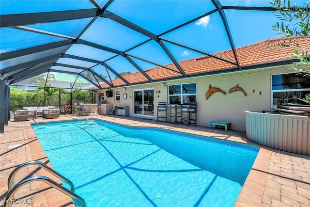 815 Rose Ct, Marco Island, FL 34145 - swimming pool featuring an outdoor living space, a patio area, and a lanai