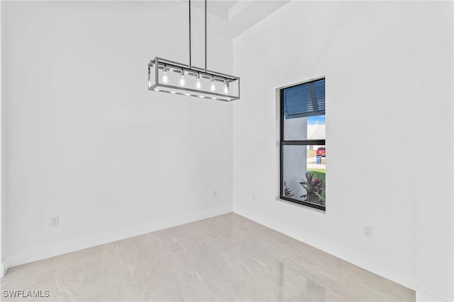 206 Jack Ave N, Lehigh Acres, FL 33971 - unfurnished room with marble finish flooring and baseboards