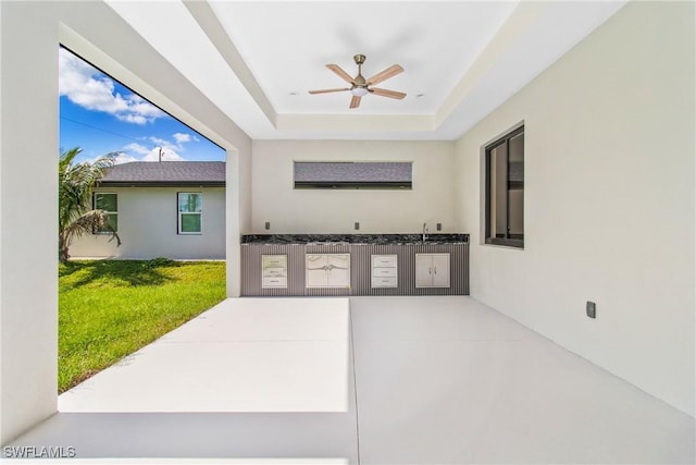 206 Jack Ave N, Lehigh Acres, FL 33971 - view of patio with exterior kitchen and a ceiling fan
