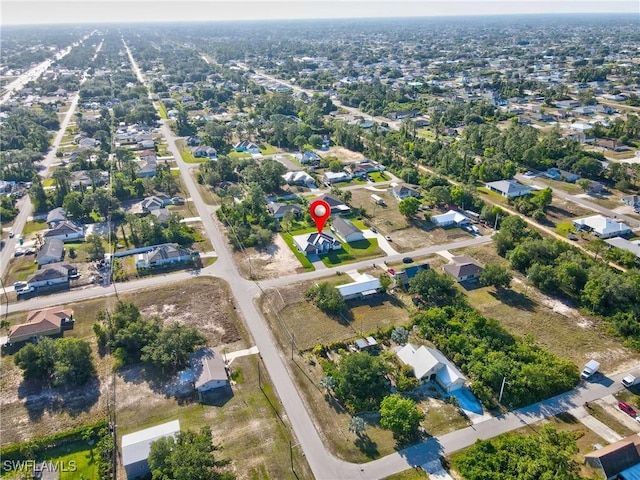 206 Jack Ave N, Lehigh Acres, FL 33971 - aerial overview of property's location with nearby suburban area