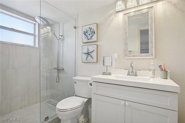 980 7th Ave S Unit 104, Naples, FL 34102 - full bathroom with a shower stall, toilet, and vanity