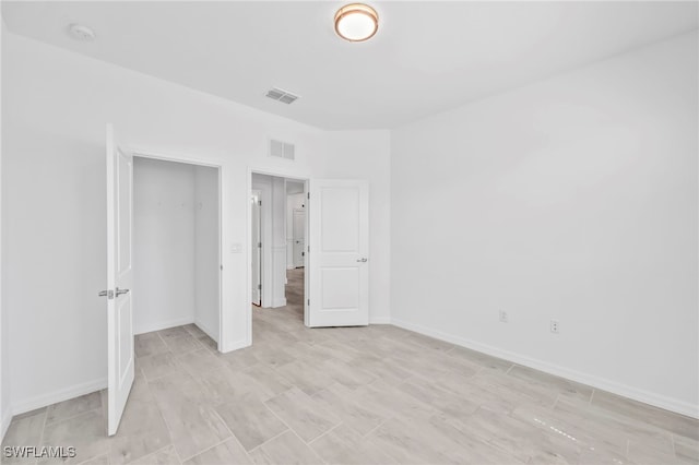 2127 Hamlin St, Naples, FL 34120 - unfurnished bedroom with baseboards