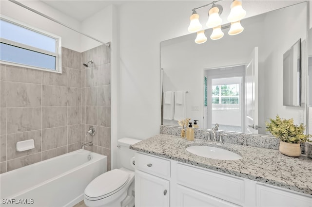2127 Hamlin St, Naples, FL 34120 - bathroom with toilet, bathing tub / shower combination, vanity, and a chandelier