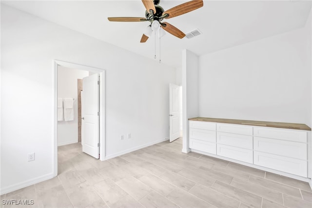 2127 Hamlin St, Naples, FL 34120 - empty room featuring ceiling fan and baseboards