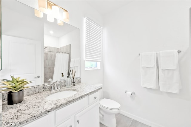 2127 Hamlin St, Naples, FL 34120 - full bathroom with toilet, a shower with shower curtain, vanity, and baseboards
