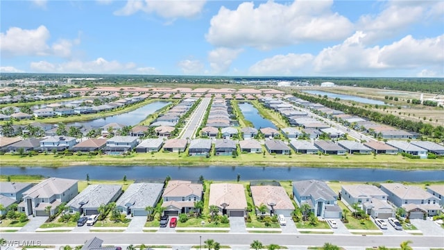 2127 Hamlin St, Naples, FL 34120 - aerial perspective of suburban area featuring a nearby body of water