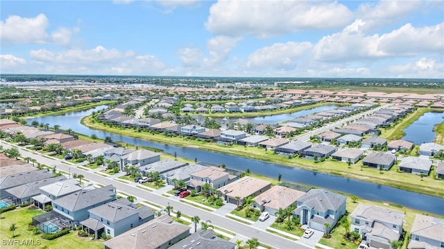 2127 Hamlin St, Naples, FL 34120 - aerial perspective of suburban area with a large body of water