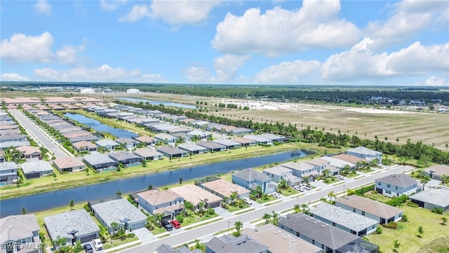 2127 Hamlin St, Naples, FL 34120 - aerial view of residential area featuring a large body of water