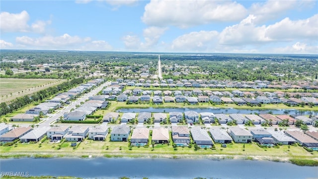 2127 Hamlin St, Naples, FL 34120 - aerial perspective of suburban area featuring a large body of water