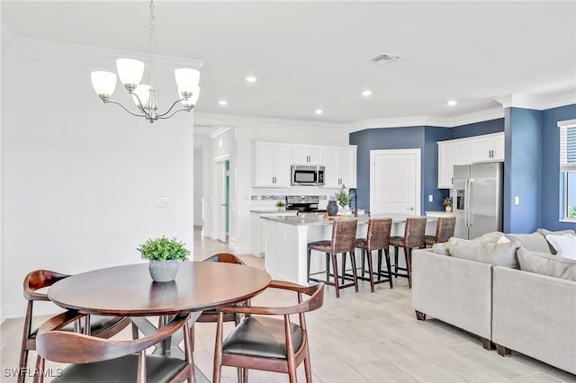 2127 Hamlin St, Naples, FL 34120 - dining space with a chandelier, recessed lighting, and ornamental molding