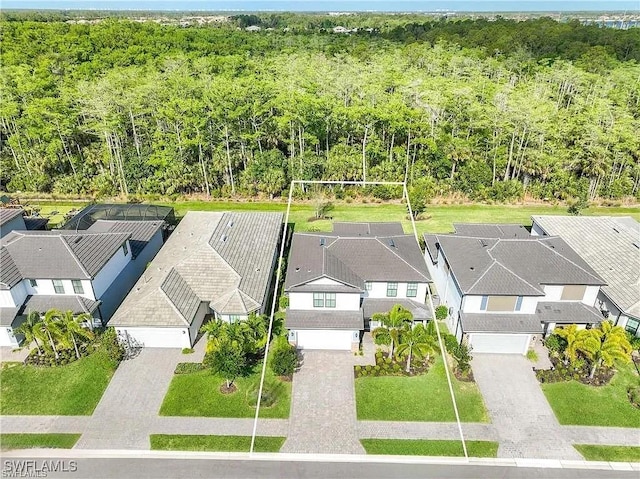 10367 Ventana Ln, Naples, FL 34120 - aerial perspective of suburban area with a heavily wooded area