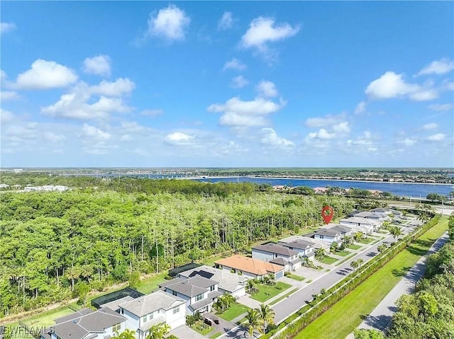 10367 Ventana Ln, Naples, FL 34120 - aerial perspective of suburban area with a nearby body of water