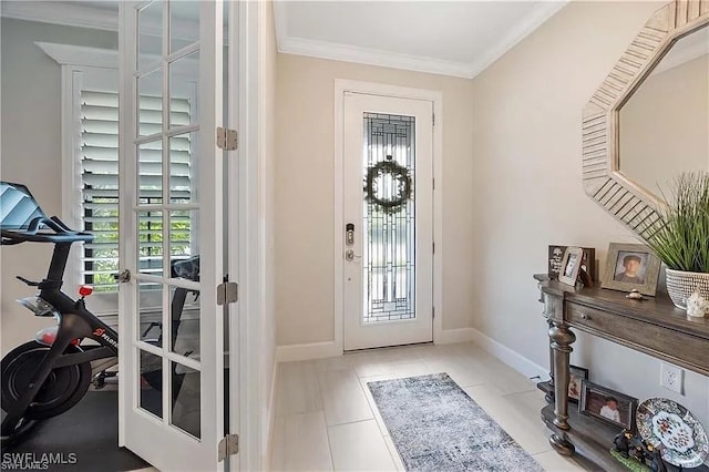 10367 Ventana Ln, Naples, FL 34120 - tiled entryway featuring plenty of natural light, crown molding, and baseboards