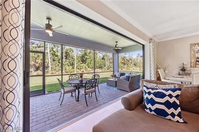 10367 Ventana Ln, Naples, FL 34120 - sunroom with a ceiling fan, an outdoor hangout area, and outdoor dining space