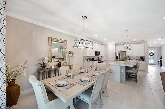 10367 Ventana Ln, Naples, FL 34120 - dining room featuring crown molding, a chandelier, recessed lighting, and baseboards