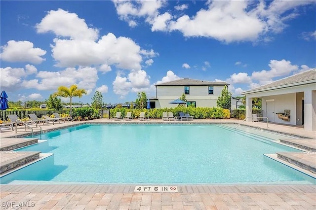 10367 Ventana Ln, Naples, FL 34120 - community pool featuring fence and a patio area